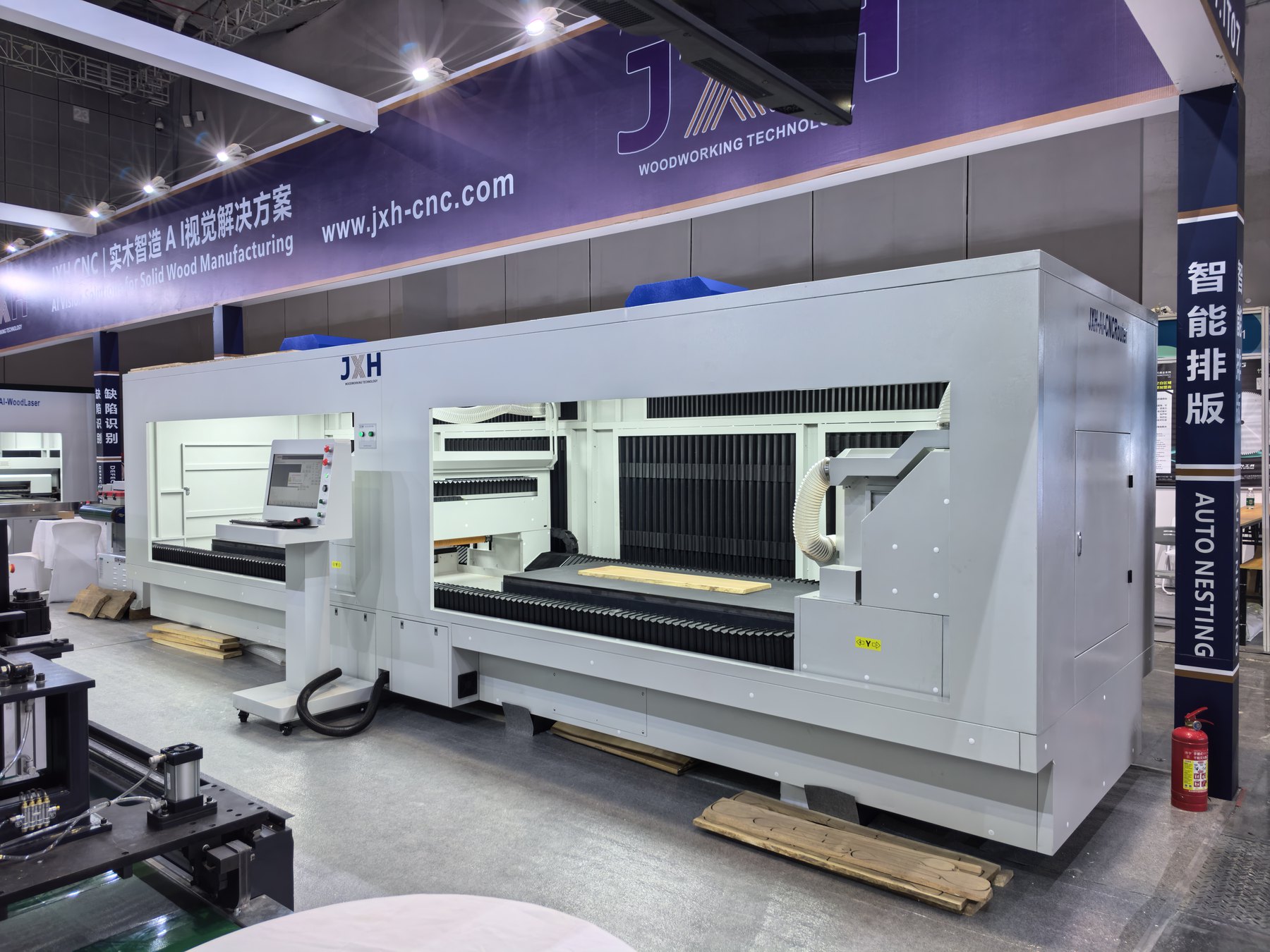 JXH CNC booth and AI solid wood machine at WMF 2026 Shanghai