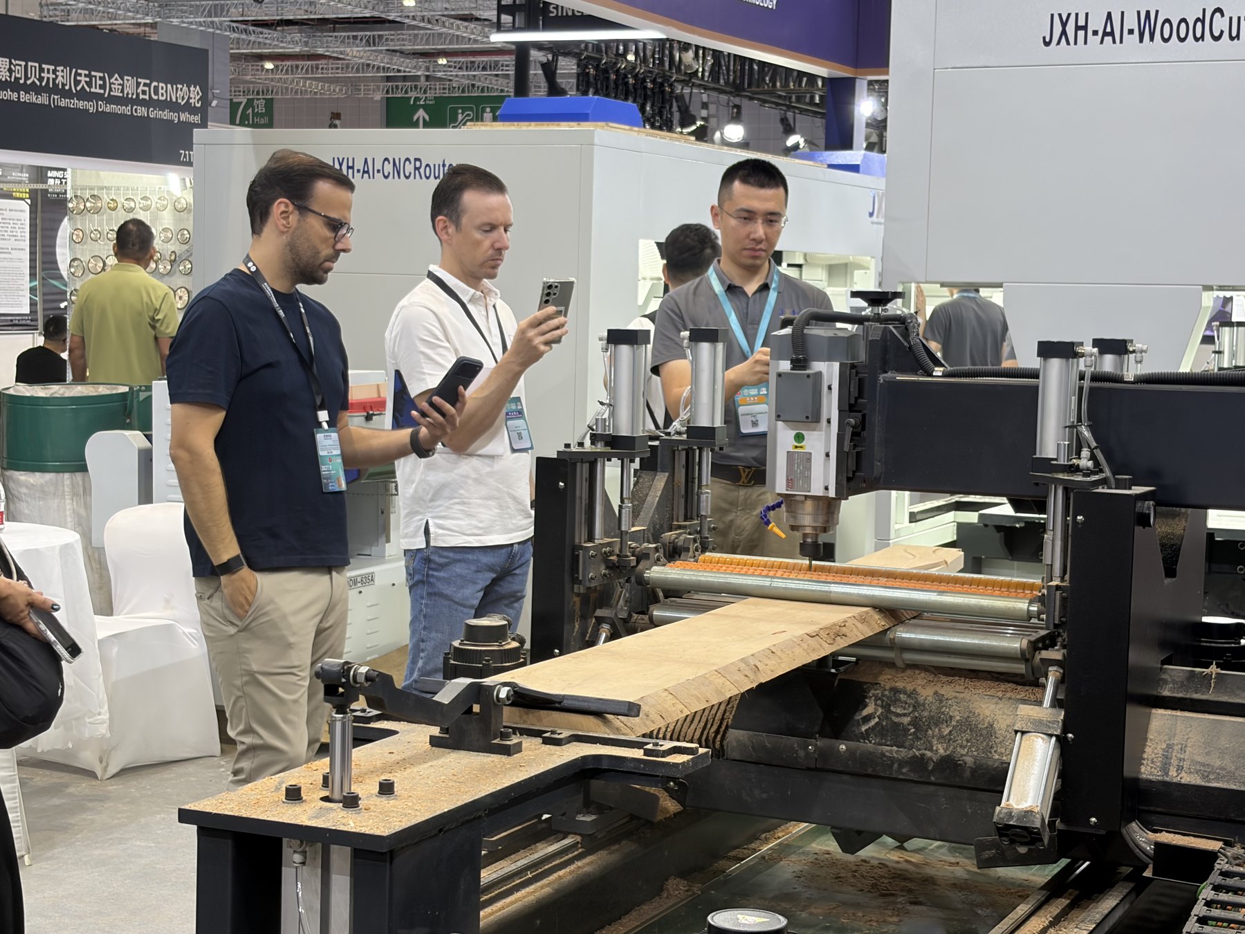 Close view of the JXH AI CNC Router cutting a natural-edge solid wood board