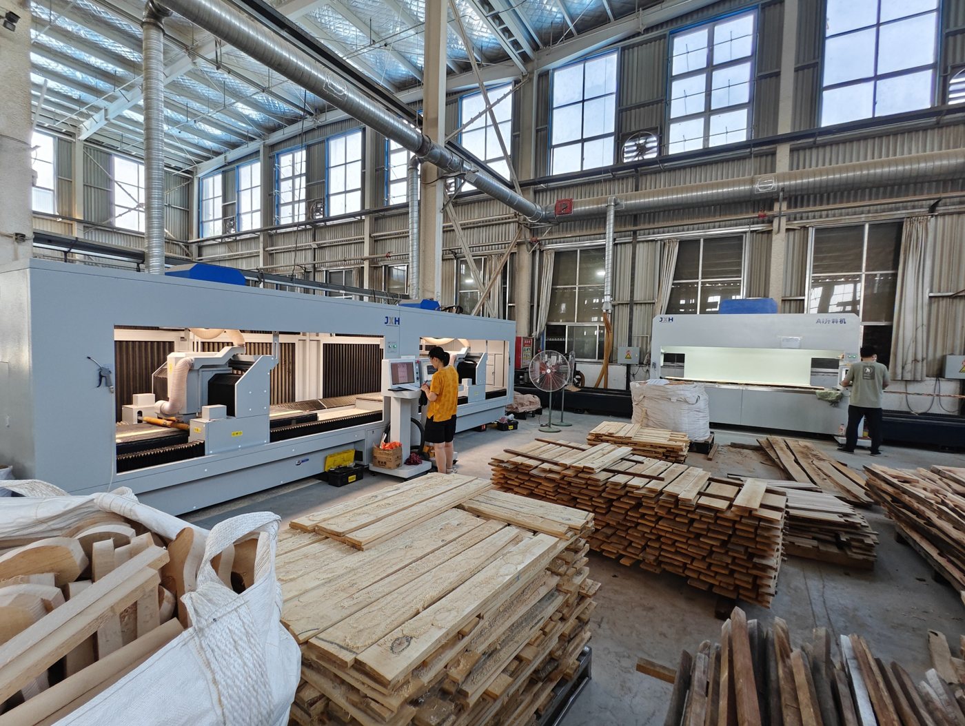 JXH AI cutting and CNC equipment in the Shandong wooden kitchenware factory.